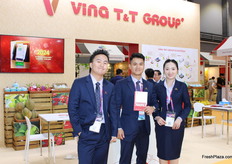 Sam, Morris, and Kate of Vina T&T Group share a moment of pride at the expo.