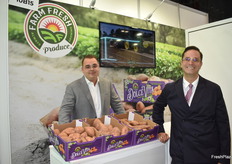 Davy van Ewijck and Steven Ceccarelli with Farm Fresh Produce have beautiful sweet potatoes from North Carolina on display.